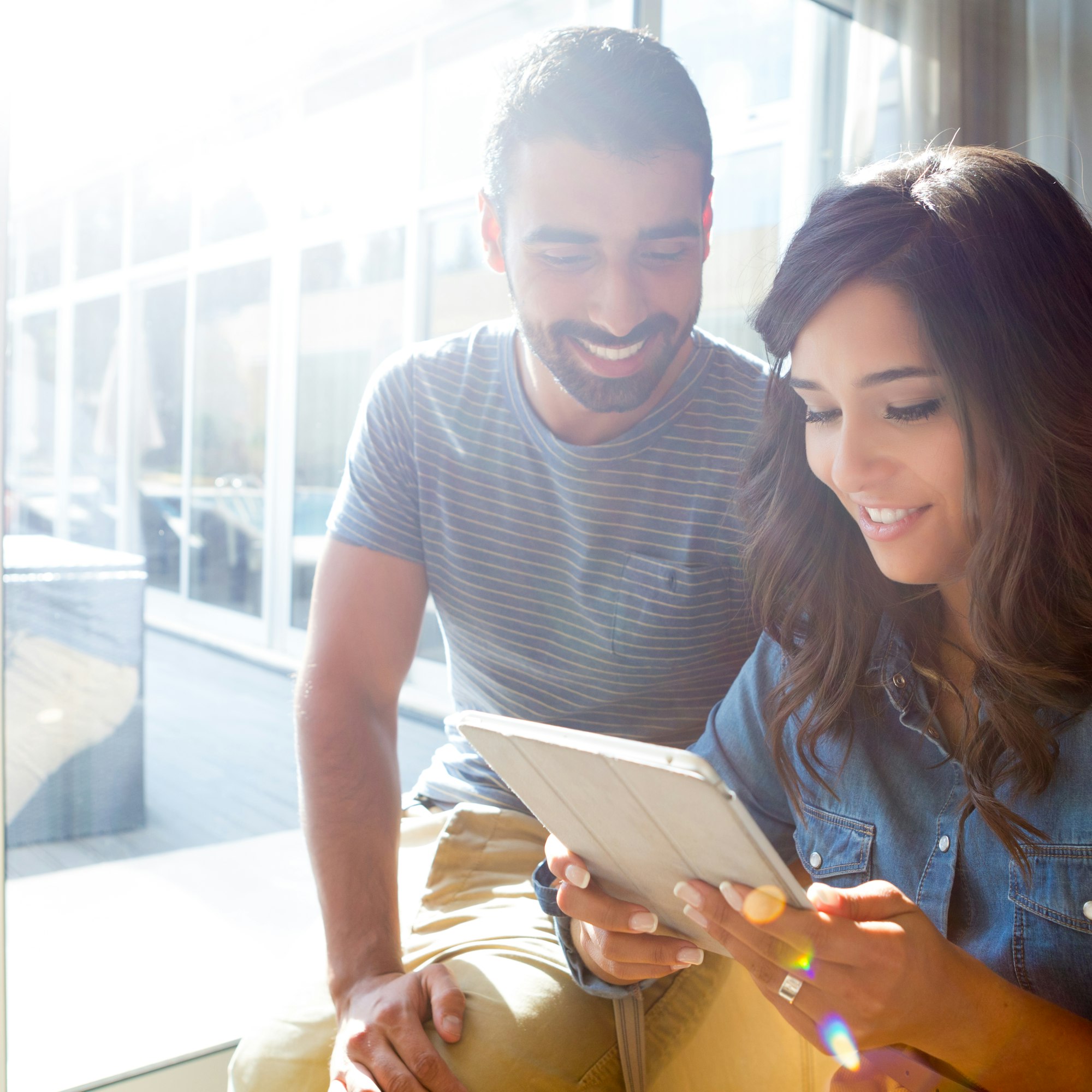 Couple using tablet