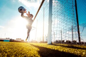 Soccer player in action on the soccer stadium